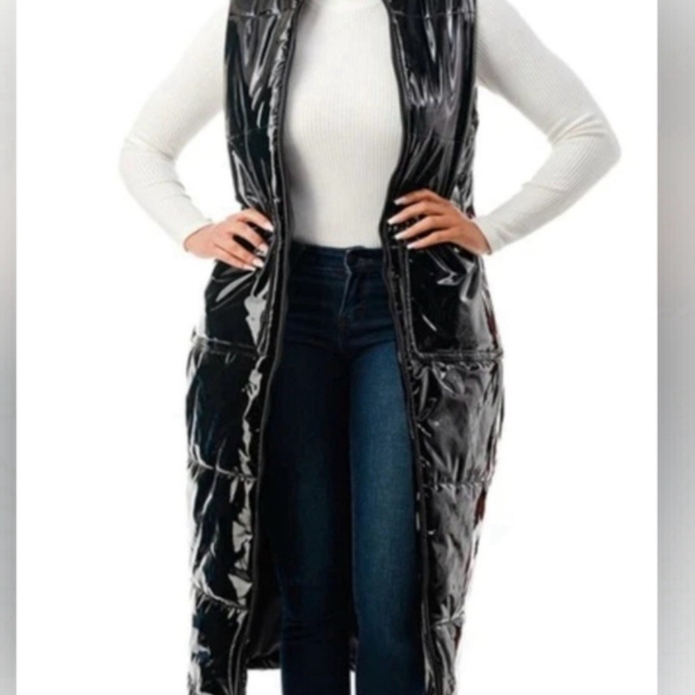 NWOT 36 Point 5 Shiny Black Long Vest never been worn.